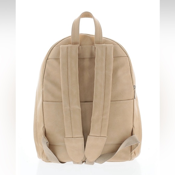 beige faux leather backpack Convertible Bag but shrunken Beige faux leather backpack. Very